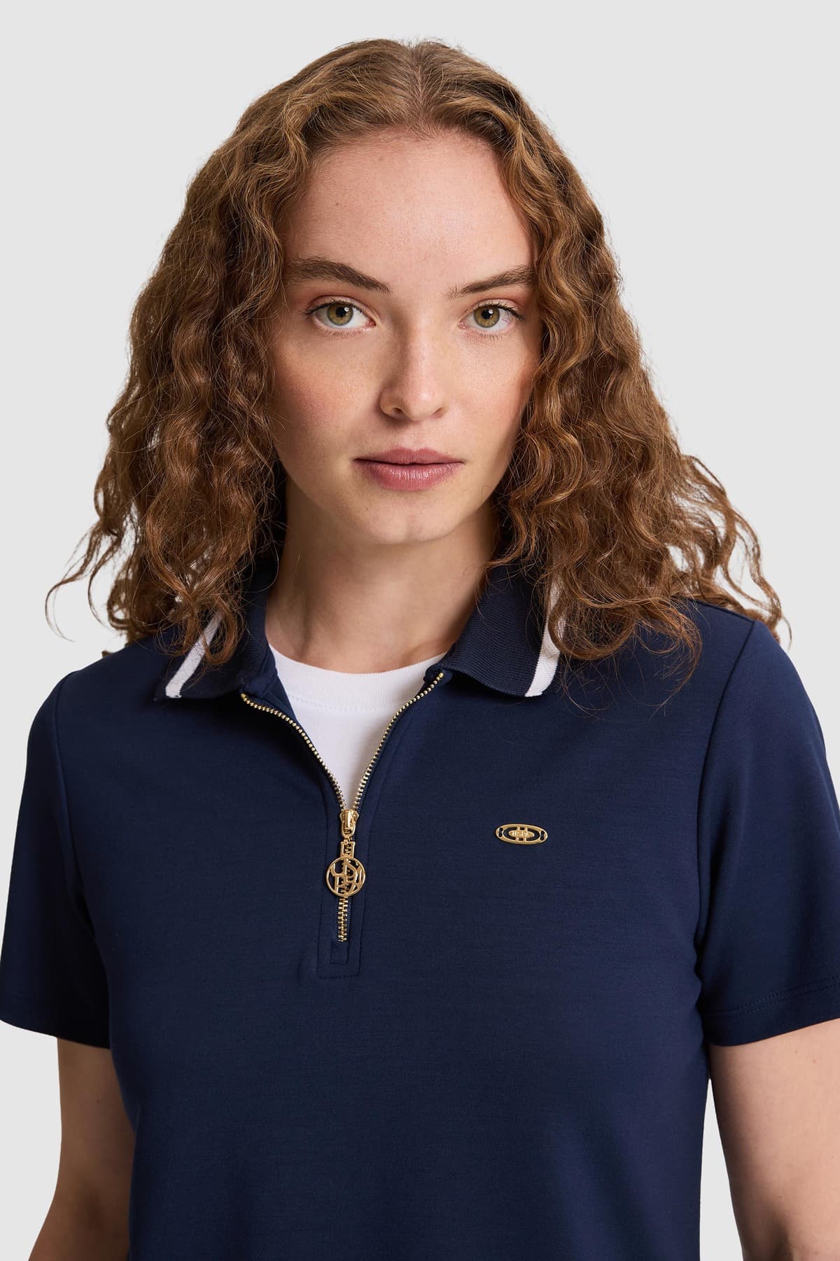 تیشرت زنانه U.S. Polo Assn. یقه پولو نیمزیپ سرمهای مدل 50323481-VR033 تیشرت زنانه U.S. Polo Assn. یقه پولو نیمزیپ سرمهای مدل 50323481-VR033