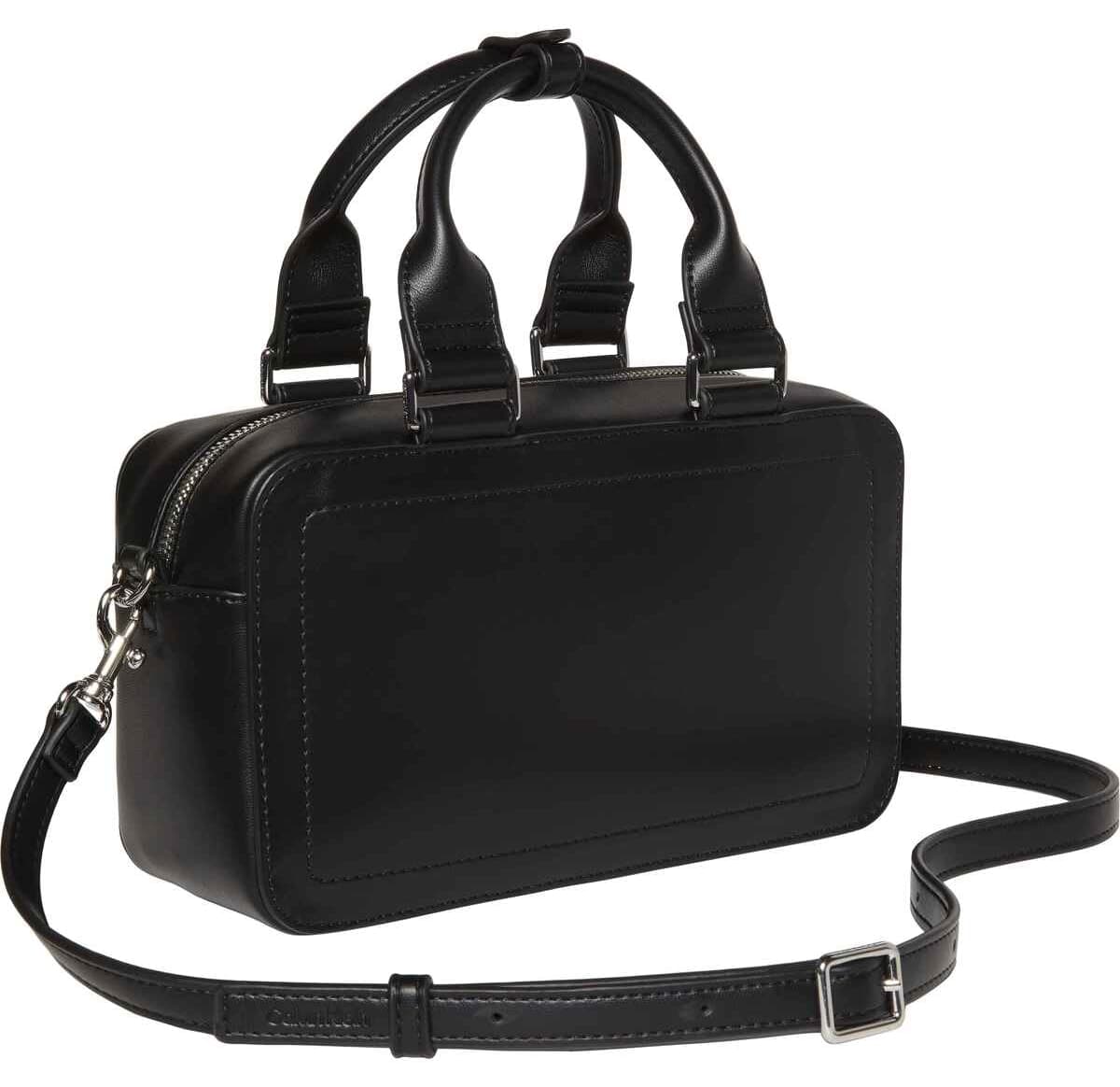 کیف دستی زنانه Calvin Klein با لوگو مشکی مناسب استفاده روزمره کیف دستی زنانه Calvin Klein با لوگو مشکی مناسب استفاده روزمره