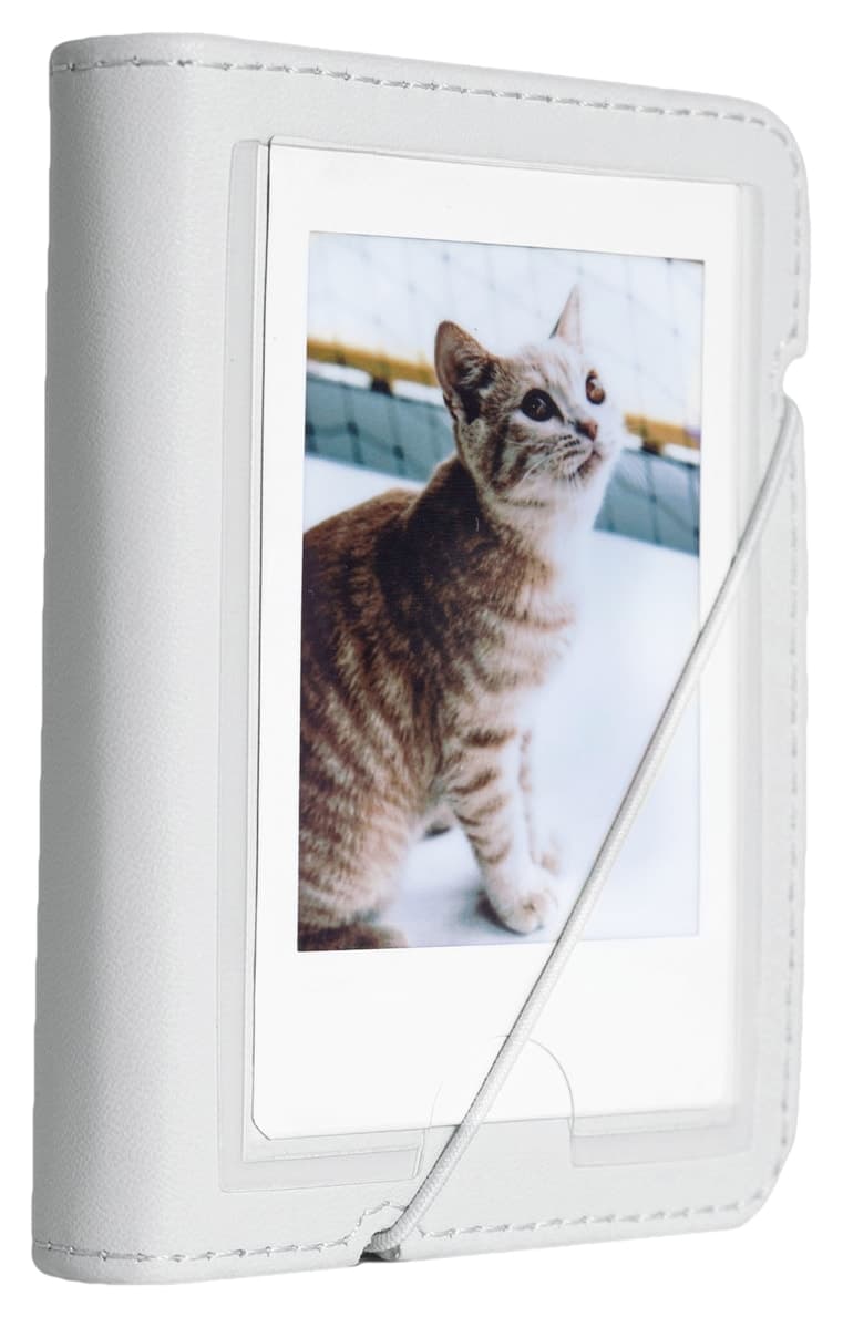 دوربین فوری Fujifilm Instax mini 12 سفید با ۱۰ فیلم، آلبوم و کیف چرمی دوربین فوری Fujifilm Instax mini 12 سفید با ۱۰ فیلم، آلبوم و کیف چرمی