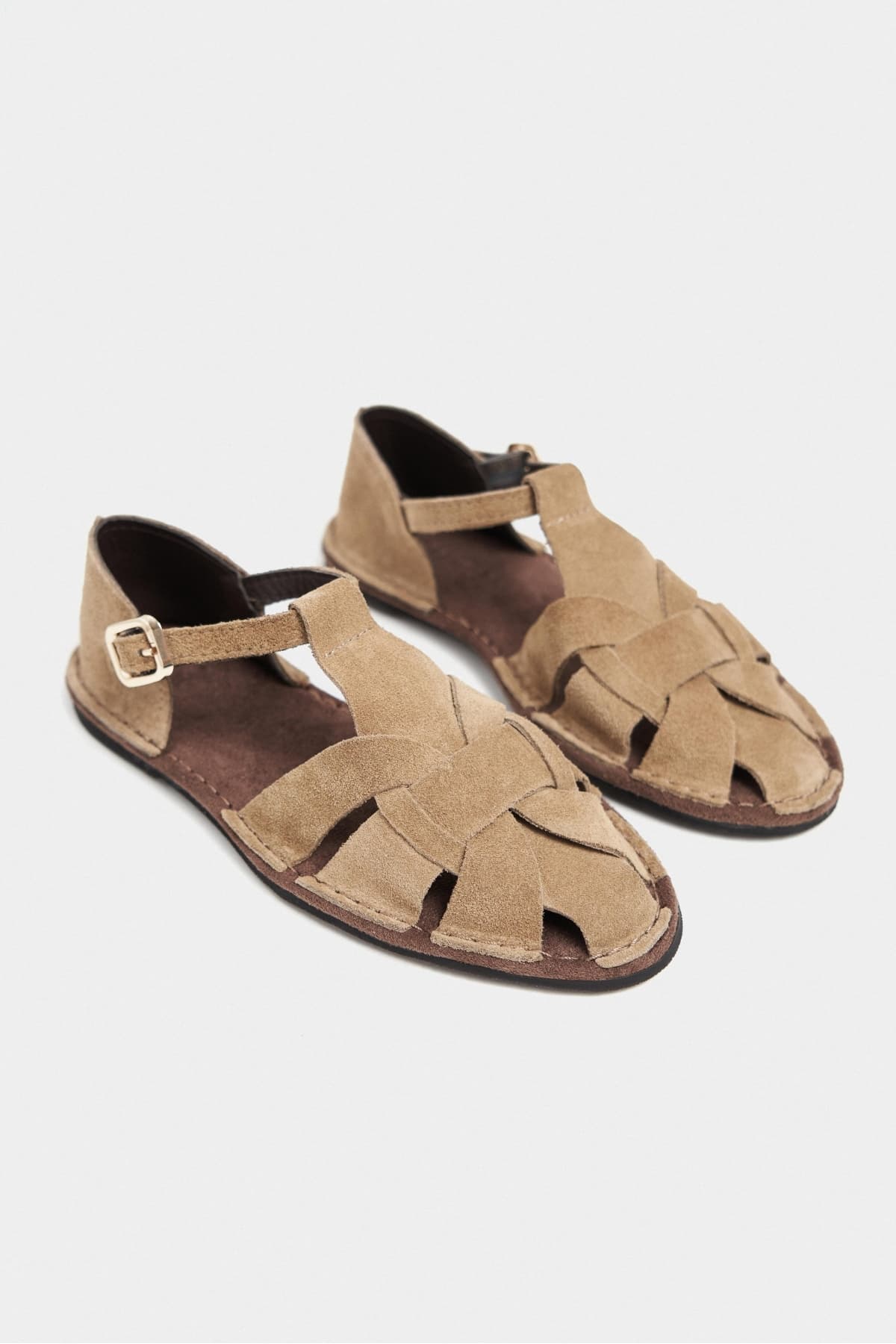 صندل زنانه NİŞANTAŞI SHOES Solto Rome چرمی بژ با جزئیات سگک و کفی تخت صندل زنانه NİŞANTAŞI SHOES Solto Rome چرمی بژ با جزئیات سگک و کفی تخت