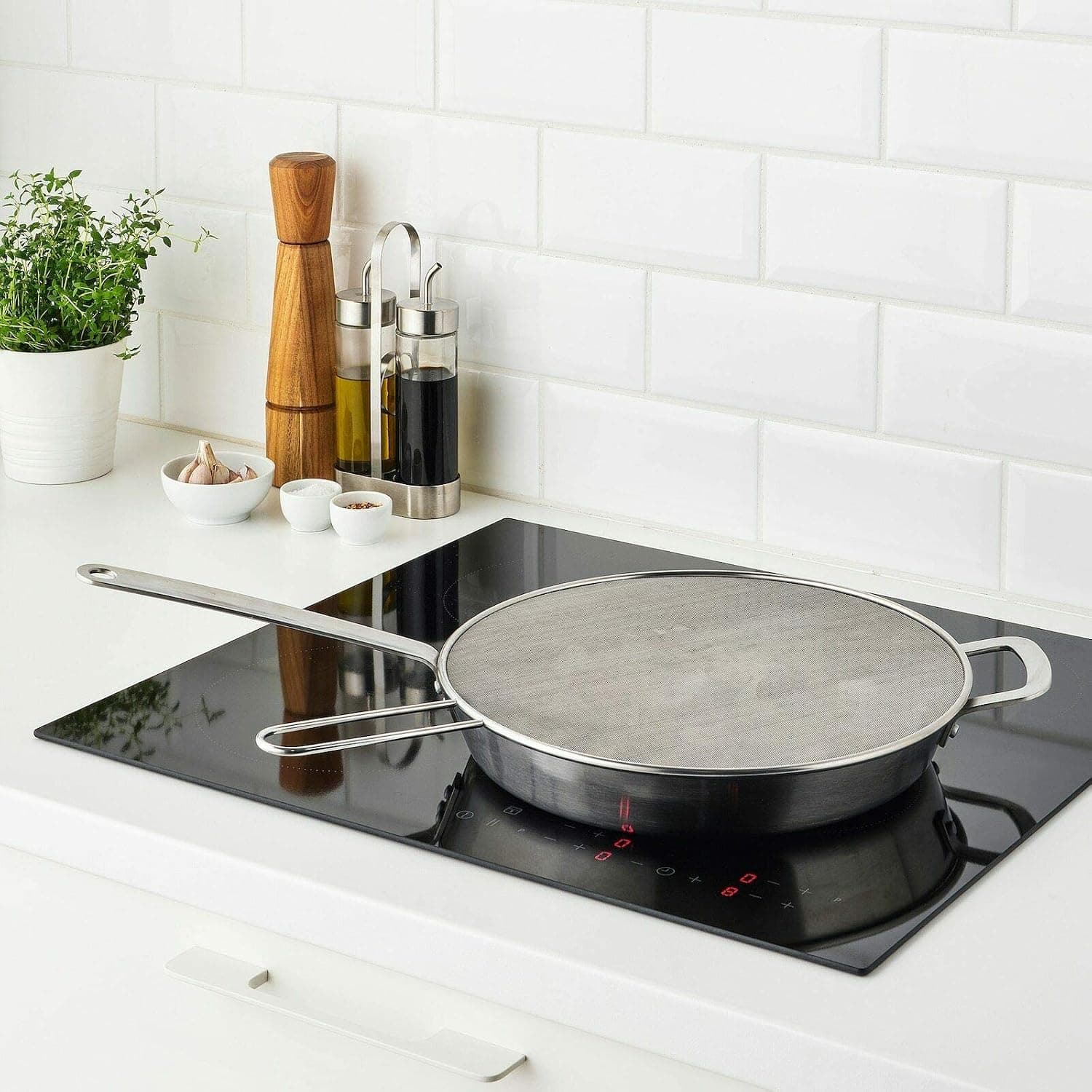 درپوش تابه دستهدار Ikea KLOCKREN توری فولادی ضدپاشش روغن 34 CM درپوش تابه دستهدار Ikea KLOCKREN توری فولادی ضدپاشش روغن 34 CM