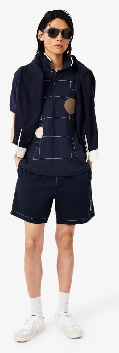 پولو شرت مردانه Lacoste فیت کلاسیک چاپدار سرمهای پولو شرت مردانه Lacoste فیت کلاسیک چاپدار سرمهای