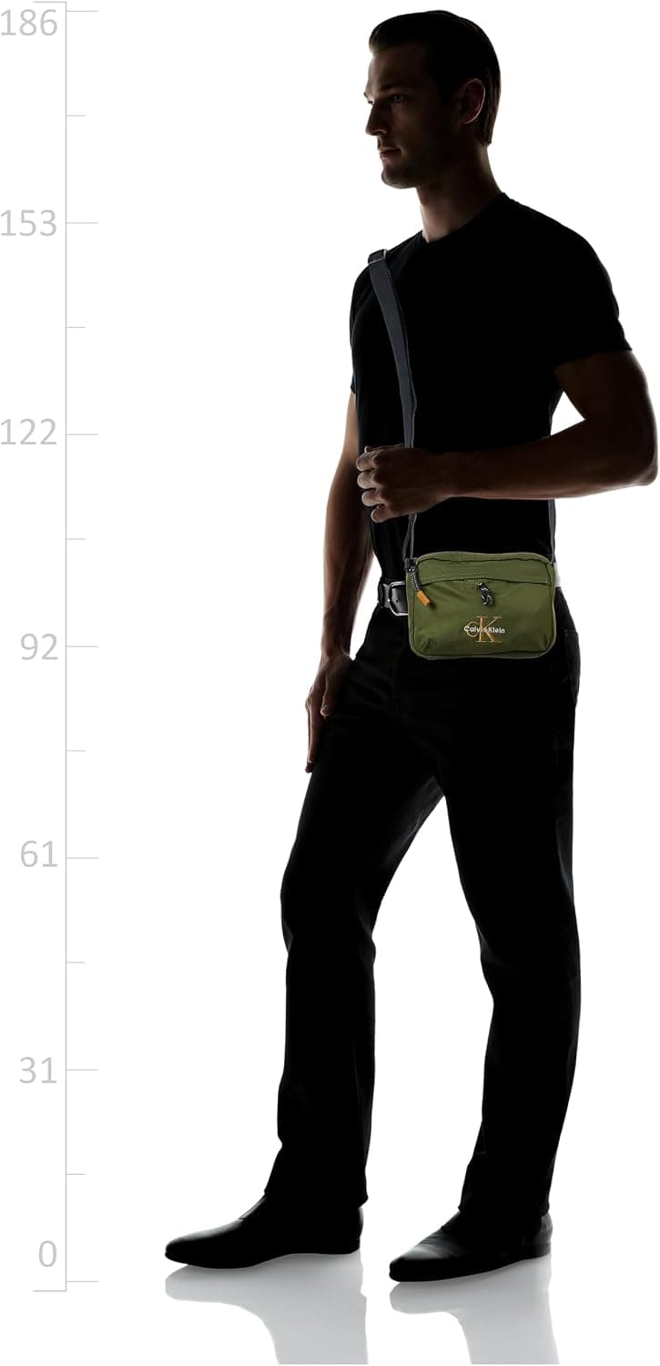 کیف دوشی مردانه Calvin Klein مدل Bold Camera Bag LV04D3117G کیف دوشی مردانه Calvin Klein مدل Bold Camera Bag LV04D3117G