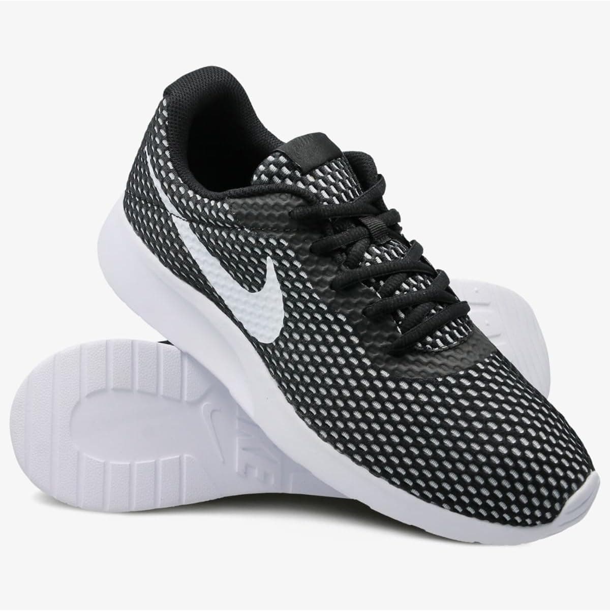کفش ورزشی مردانه Nike Tanjun Se مشکی سفید مدل 844887-012 کفش ورزشی مردانه Nike Tanjun Se مشکی سفید مدل 844887-012