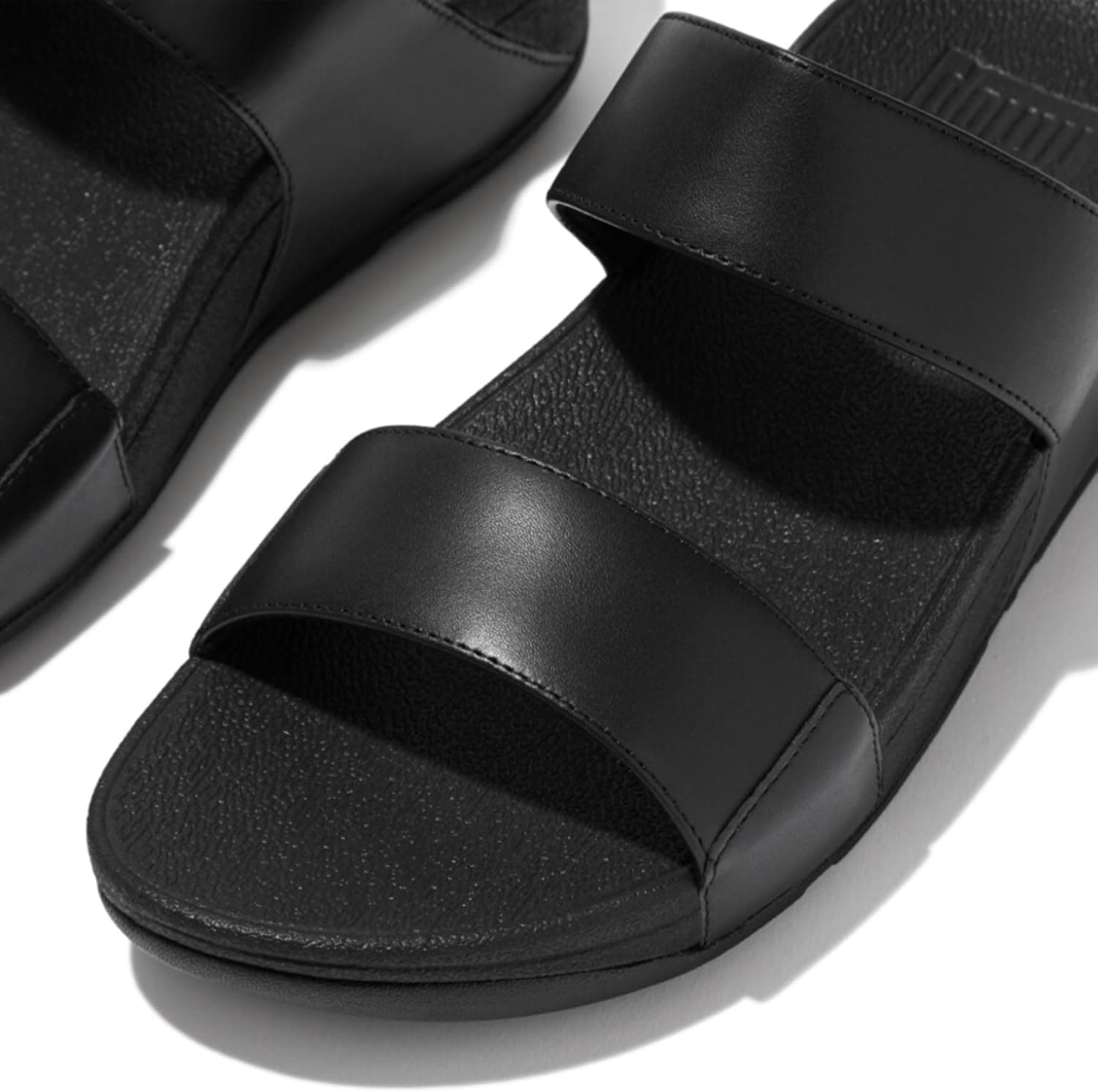 صندل زنانه Fitflop چرمی مدل Lulu Slide صندل زنانه Fitflop چرمی مدل Lulu Slide