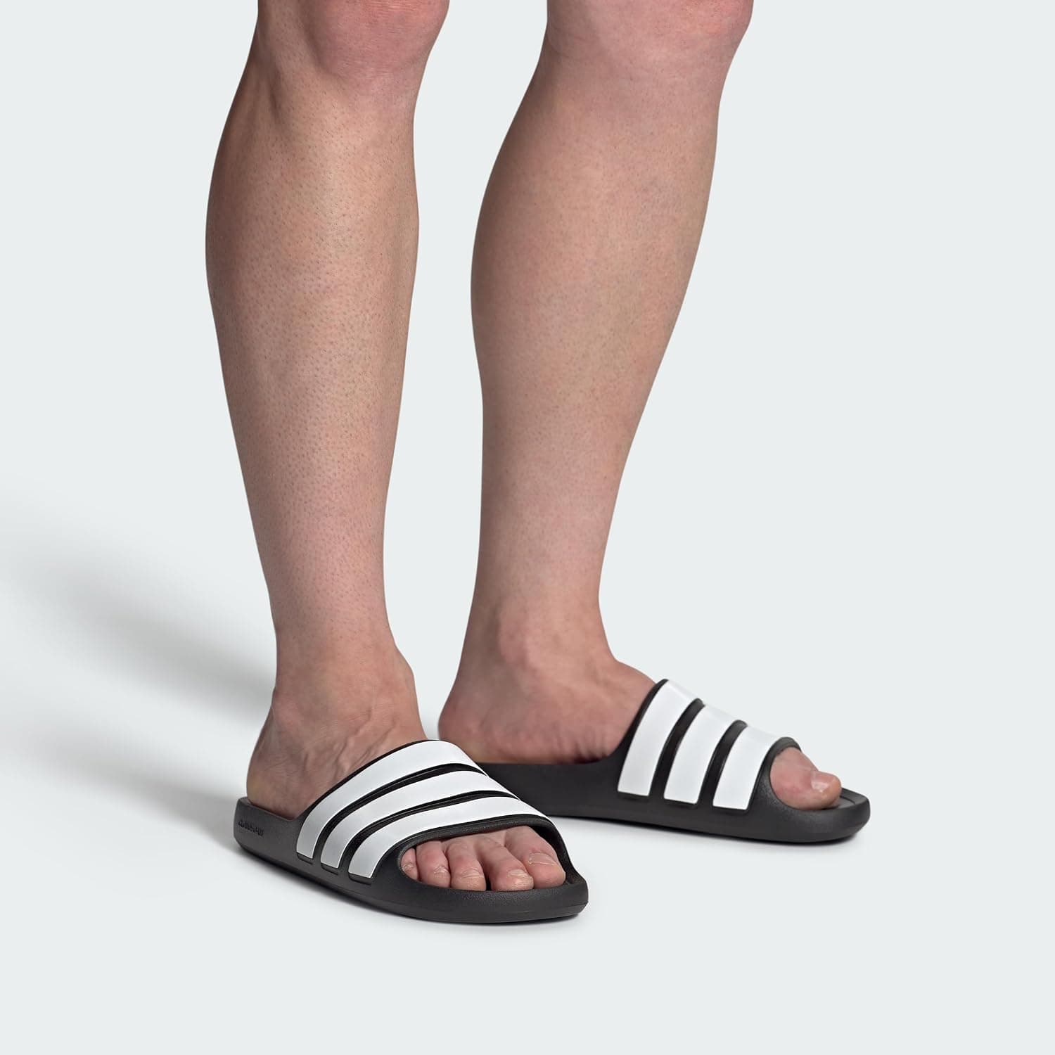 دمپایی یونیسکس بزرگسال adidas Adilette Flow Slides دمپایی یونیسکس بزرگسال adidas Adilette Flow Slides