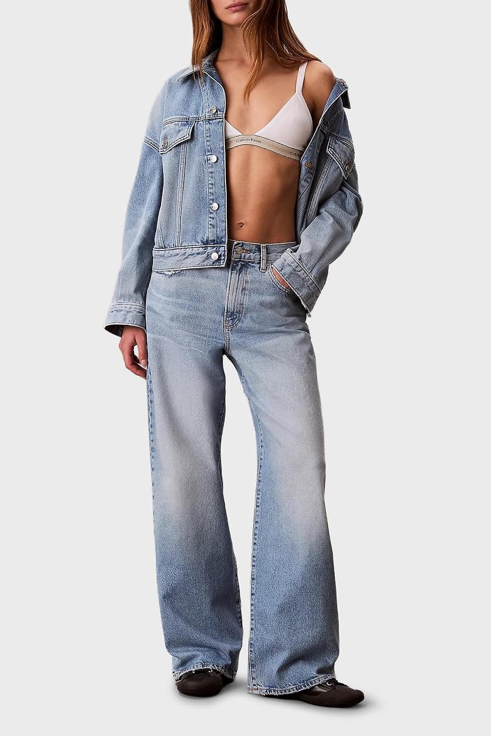 شلوار جین زنانه Calvin Klein نخی پاچه گشاد کمر بلند مدل LV047F728G SD9 شلوار جین زنانه Calvin Klein نخی پاچه گشاد کمر بلند مدل LV047F728G SD9