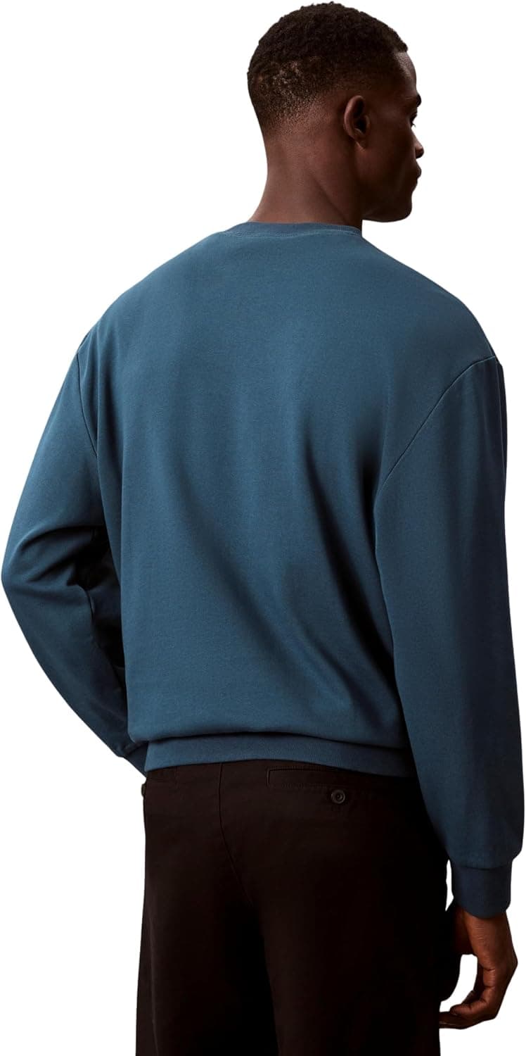 سوئیشرت مردانه Calvin Klein یقه گرد آرمدار 350Terry مدل LV04RC273GUB1 سوئیشرت مردانه Calvin Klein یقه گرد آرمدار 350Terry مدل LV04RC273GUB1
