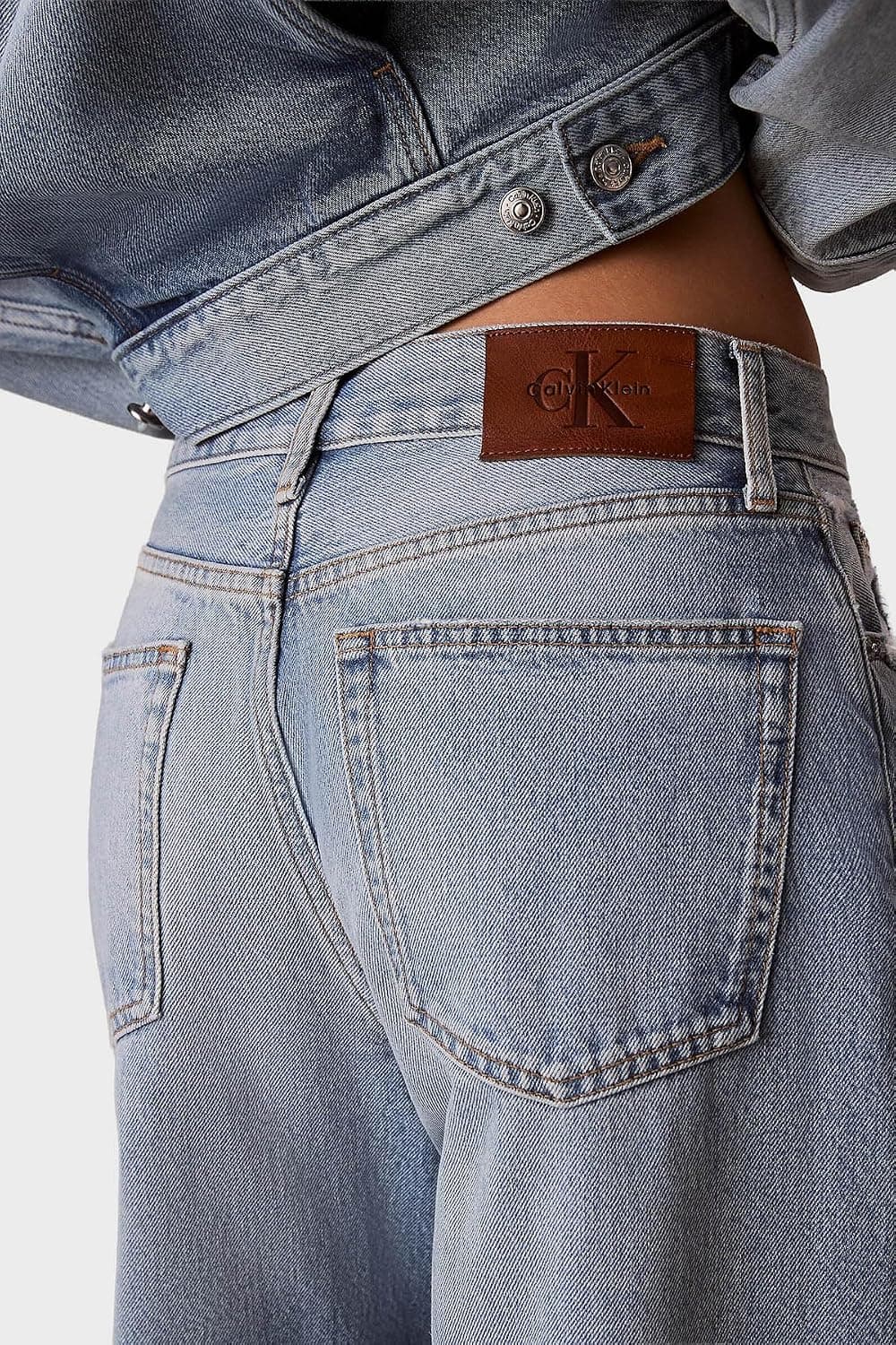 شلوار جین زنانه Calvin Klein نخی پاچه گشاد کمر بلند مدل LV047F728G SD9 شلوار جین زنانه Calvin Klein نخی پاچه گشاد کمر بلند مدل LV047F728G SD9